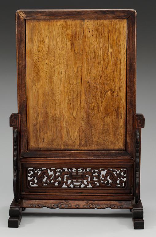 A famille rose screen on a wooden stand, Qing dynasty, 19th Century.