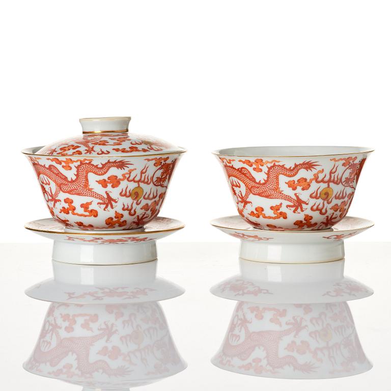A pair of five clawed dragon bowls on stands and a cover, Qing dynasty, Daoguang mark and period (1821-50).