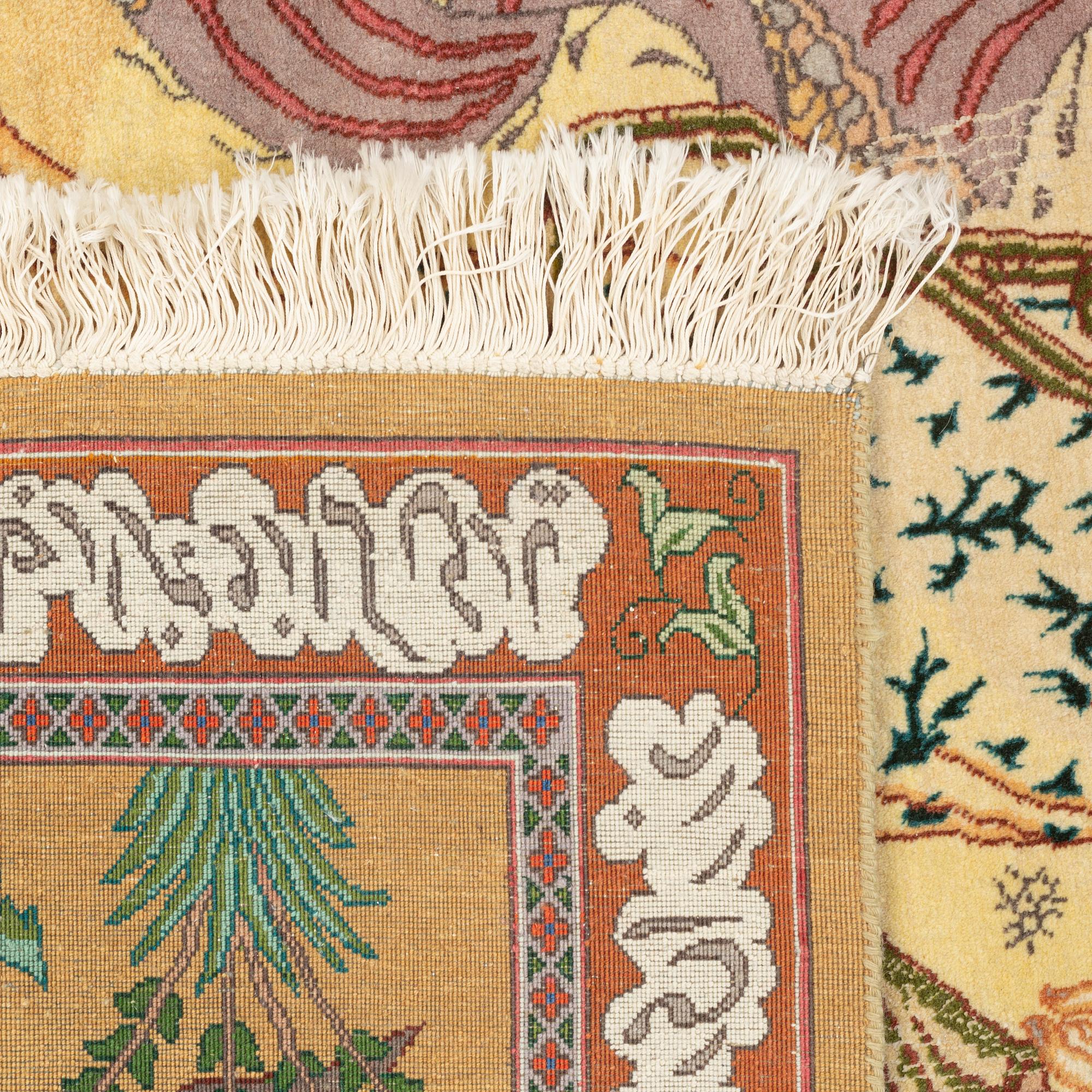A Tabriz rug, ca 145 x 100 cm.