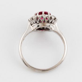 Pink spinel and brilliant cut diamond cluster ring.