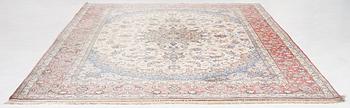 An Isfahan carpet, signed, approx. 372 x 255 cm.