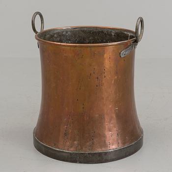 A 19th century copper barrel.