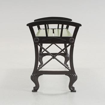A Folke Bensow cast iron and wood park bench, Näfveqvarn, 20th Century.