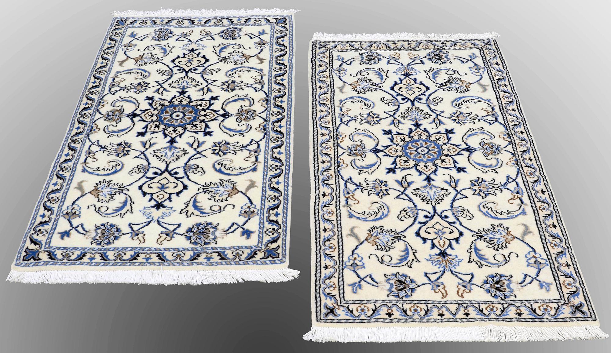 Two Nain rugs, ca 138 x 70 and 140 x 70 cm.