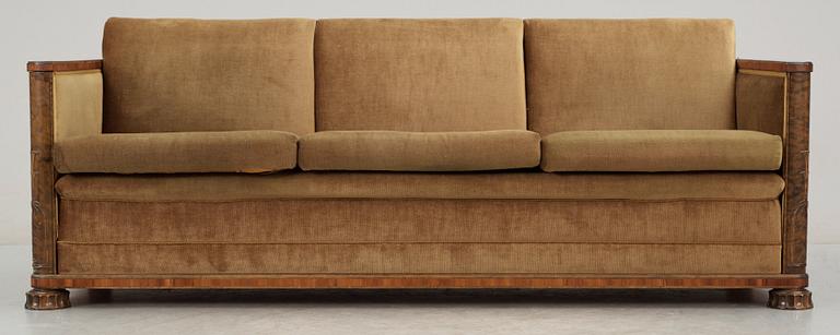 A Swedish 1930's stained birch sofa attributed to Alvar Andersson.