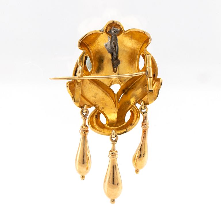 Brooch 18K gold with a cultured pearl.