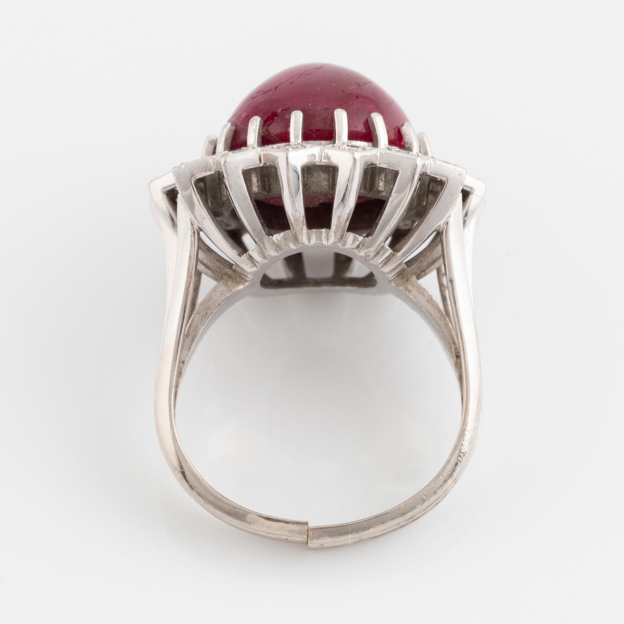 Ring, Strömdahls, with a cabochon-cut ruby and brilliant cut diamonds.