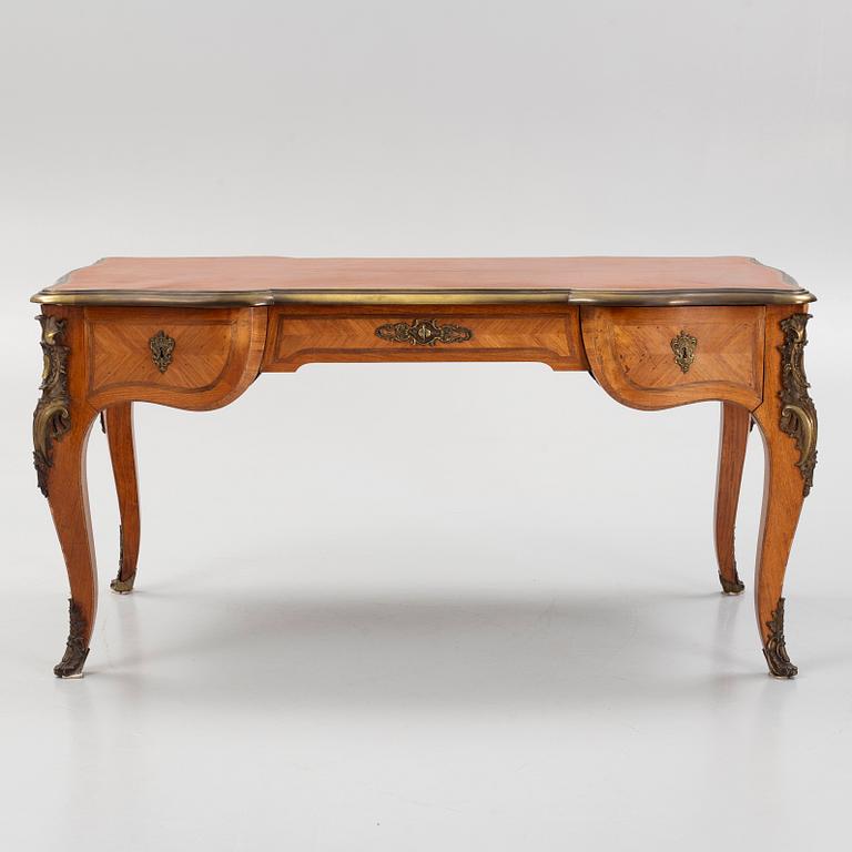 A French Louis XV-style parquetry and gilt bronze-mounted 'bureau plat', late 19th century.