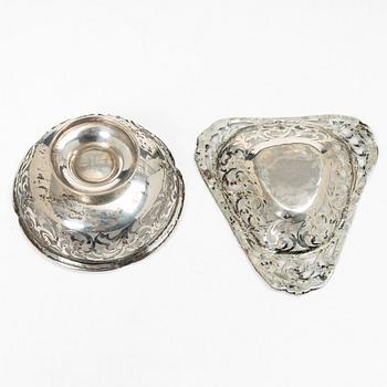 Two pierced silver bowls and two sugar spoons, including Sweden and Endland, 20th century.