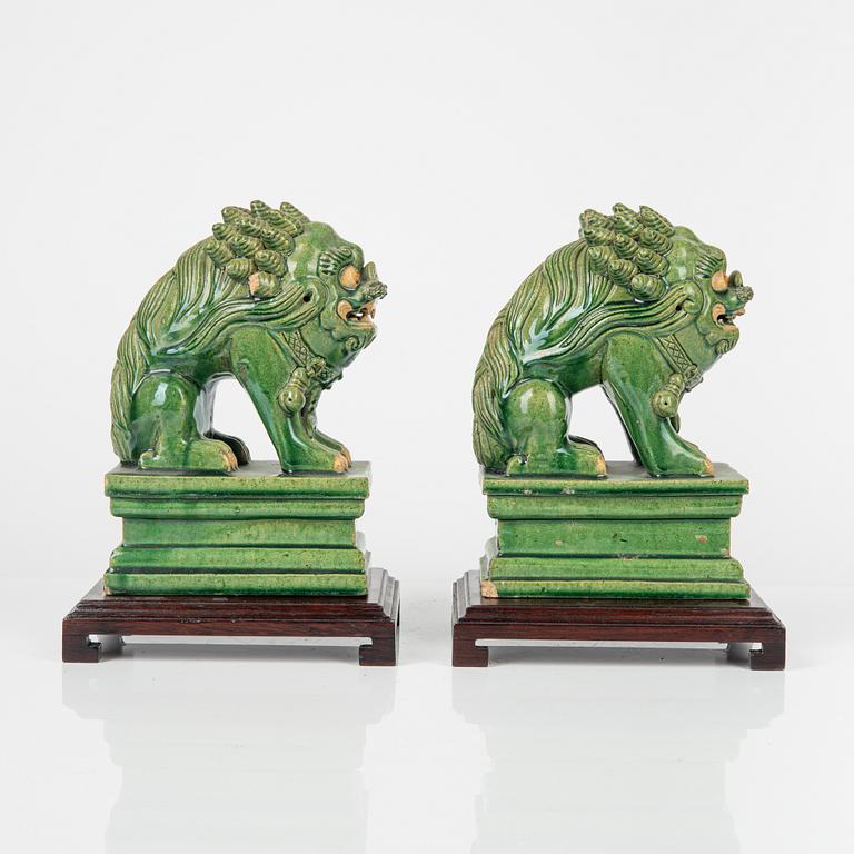 A pair of green glazed figures of mythical beasts, Ming style, China, 20th Century.