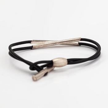 Christoph Burger, A necklace and a bracelet "Edition amour", sterling silver and rubber strap. Lapponia 2003.