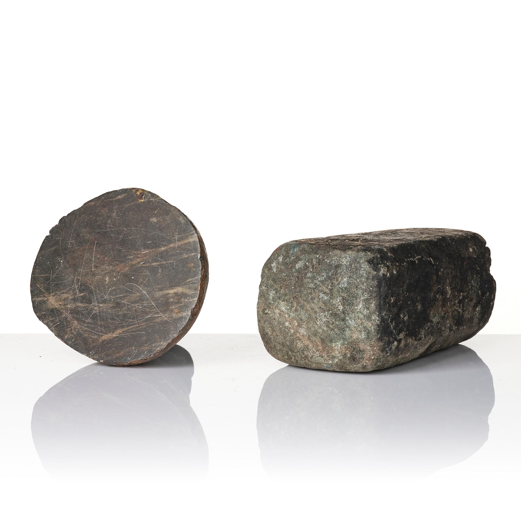 Two stone pigment graters, 18th / 19th century.