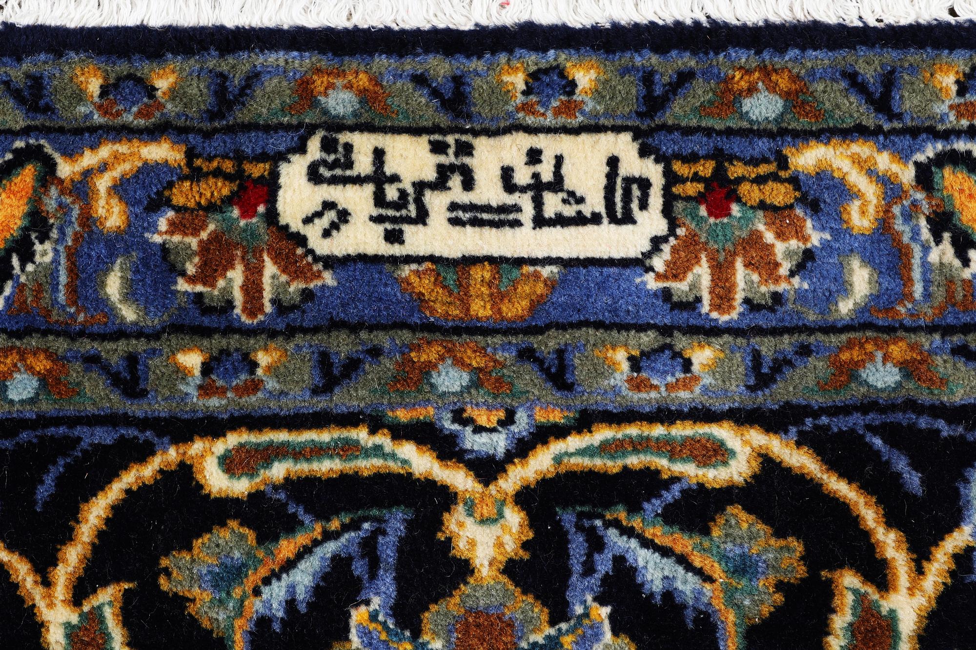 A carpet, Kashan, c. 393 x 297 cm.