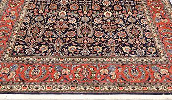A part silk Sarouk rug, signed, approx. 240 x 208 cm.