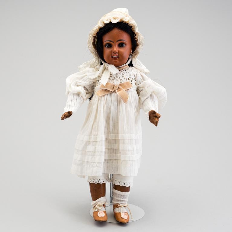 A bisque head doll, early 20th century.