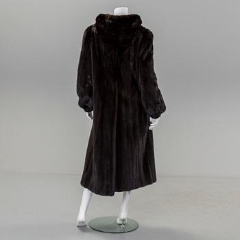 A mink coat by Saga Mink, in size 38/40.