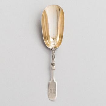 A Russian silver, parcel-gilt tea caddy spoon, Moscow from around the turn of teh century/ early 20th century.