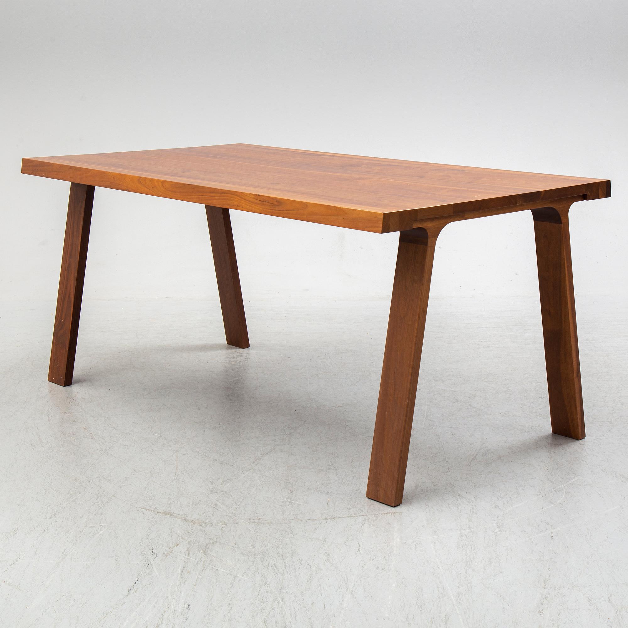 GIJS PAPAVOINE, A walnut 'Doble' dining table from Montis, The Netherlands, 2014.