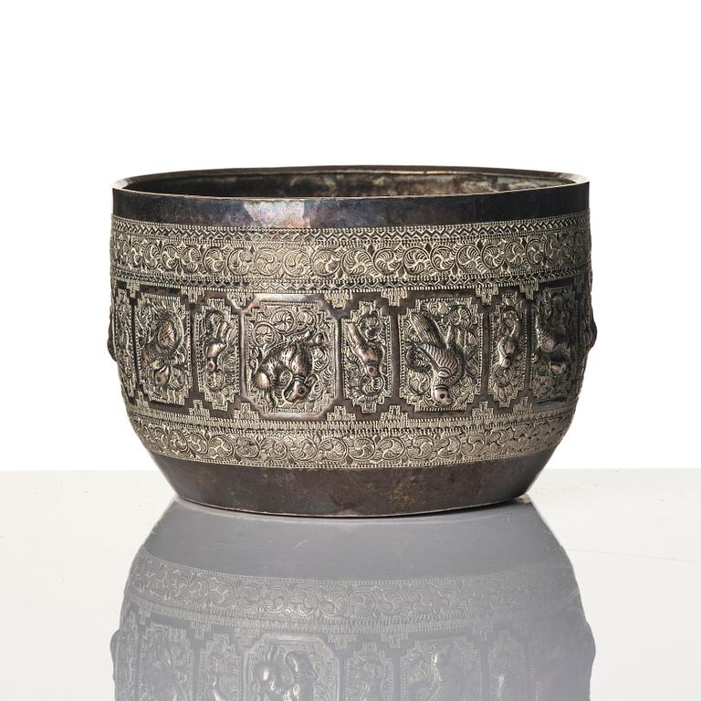 A Chinese brushpot, Qing dynasty, circa 1900. An archaistic bronze ewer and a silvered South East Asian bowl with stand.