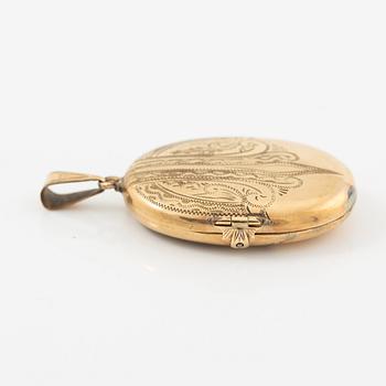 Medaljong 14K guld.