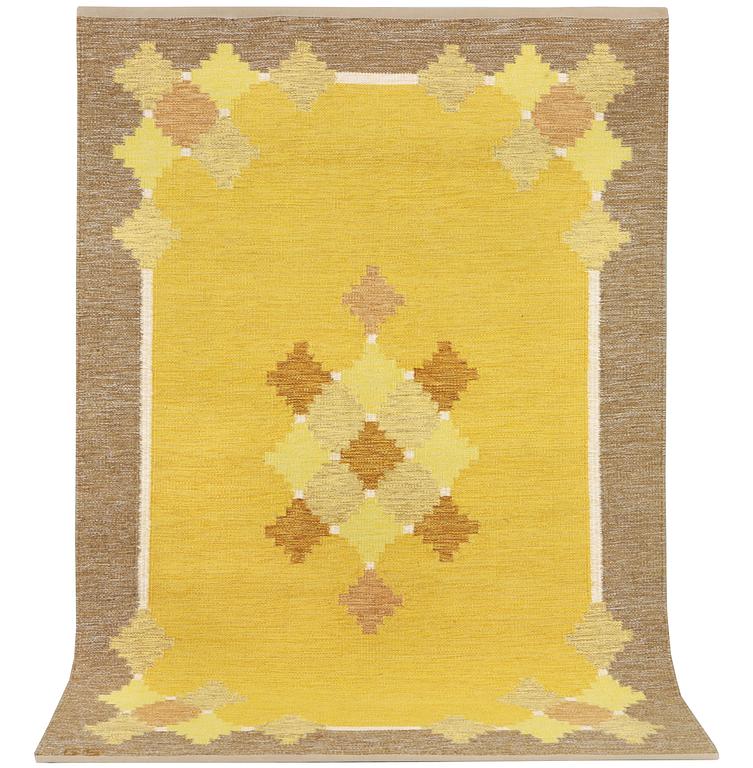 A flat weave carpet, signed GS, c. 205 x 139 cm.