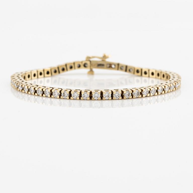 Tennis bracelet, 18K gold with brilliant-cut diamonds.