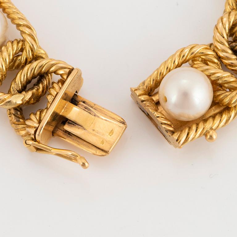 Armband 18K guld med odlade pärlor.