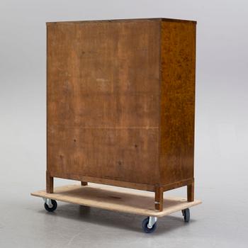 A Swedish Modern birch veneered cabinet, 1930's.