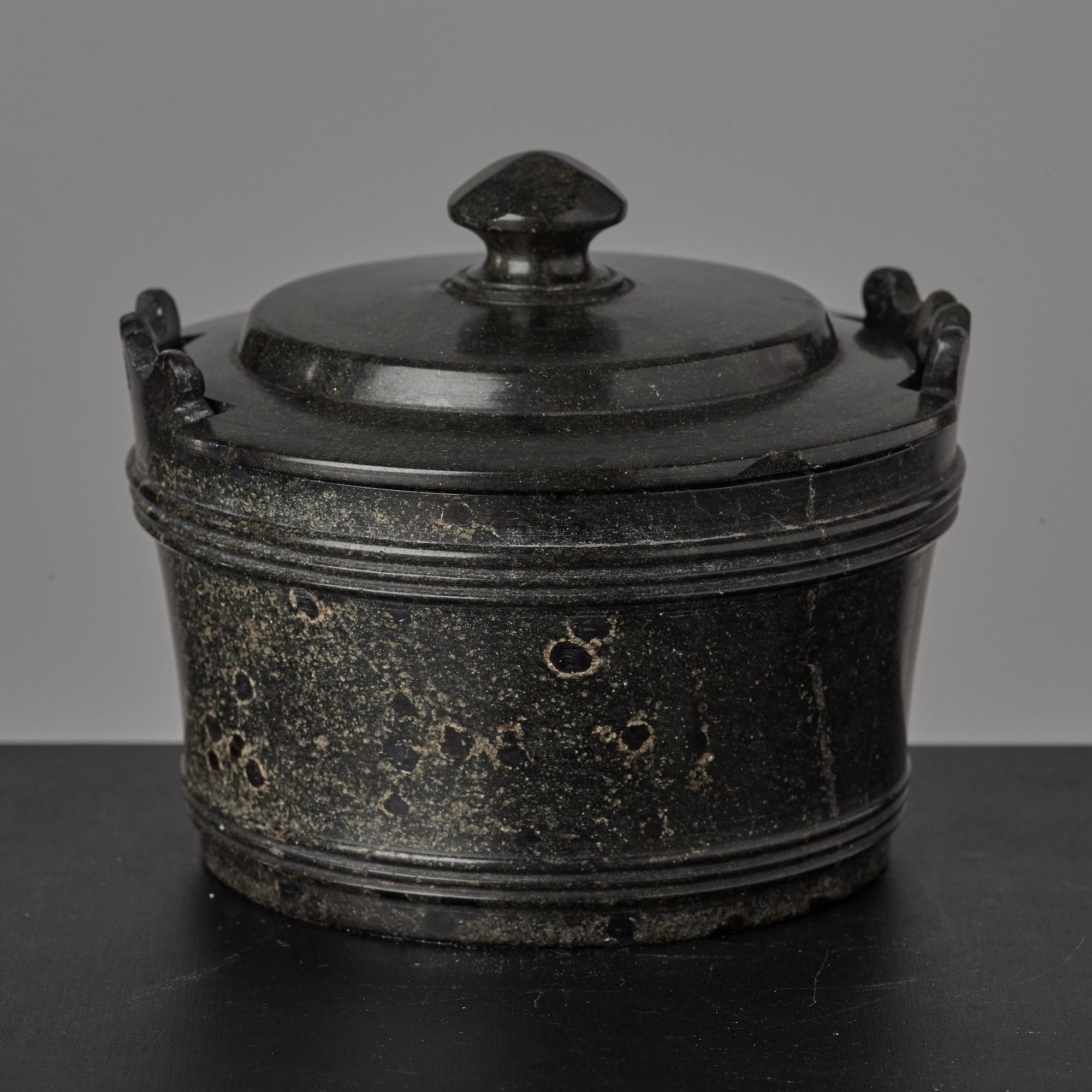 A serpentine stone butter box and cover circa 1800.