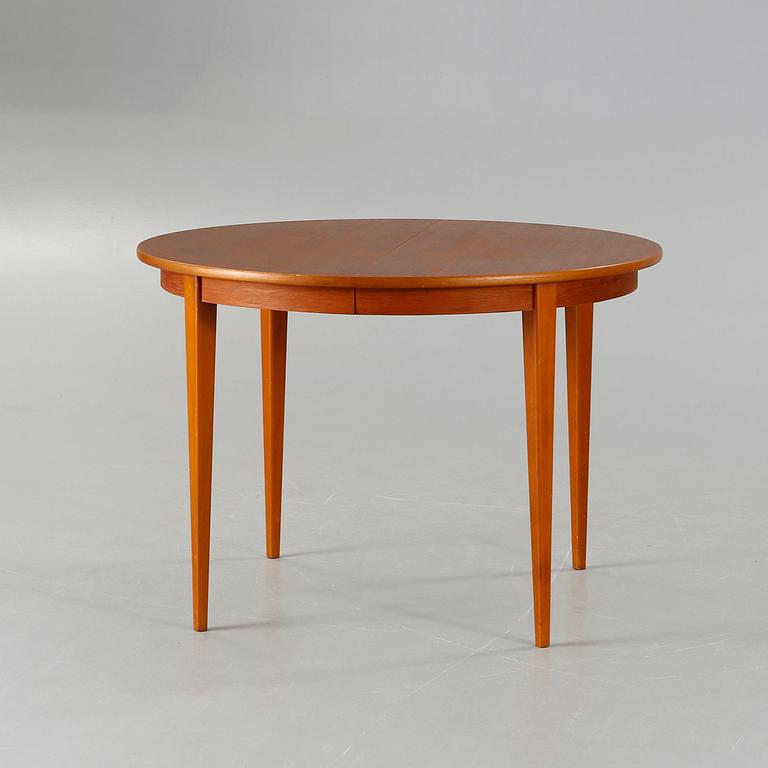 A dining table made in the middle of the 20th century.