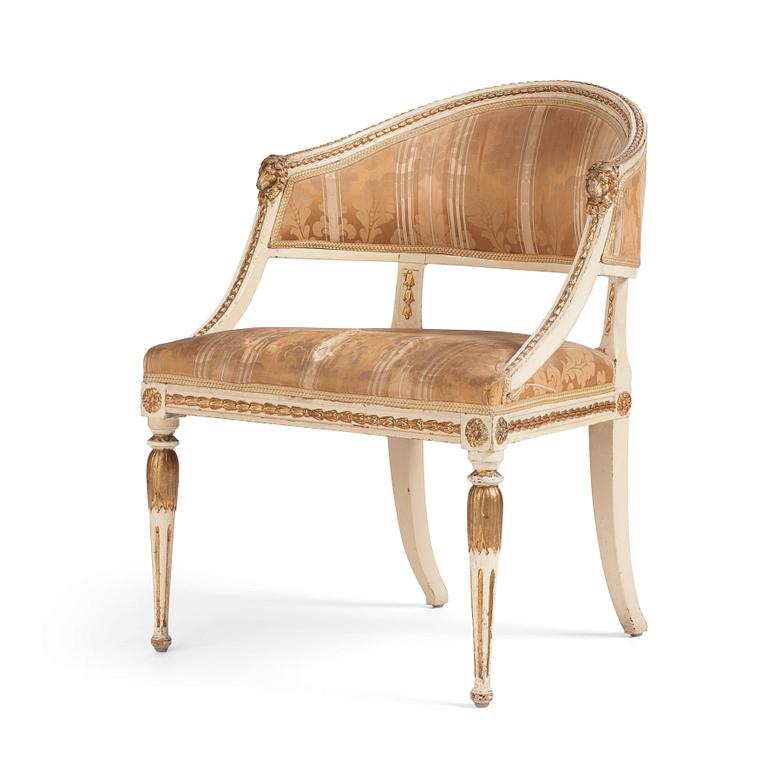 A late Gustavian carved and part-gilt open armchair, late 18th century.