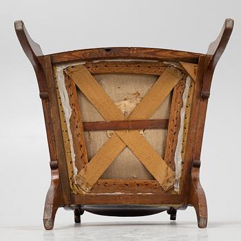 A Russian/Baltic Empire mahogany armchair, first part of the 19th century.