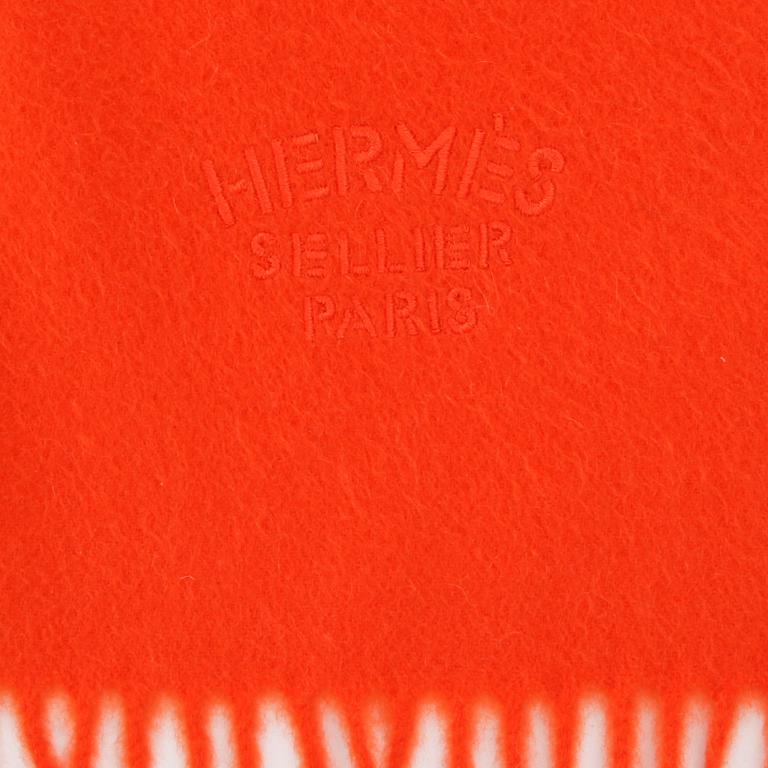 HERMÈS, a orange cashmere shawl.