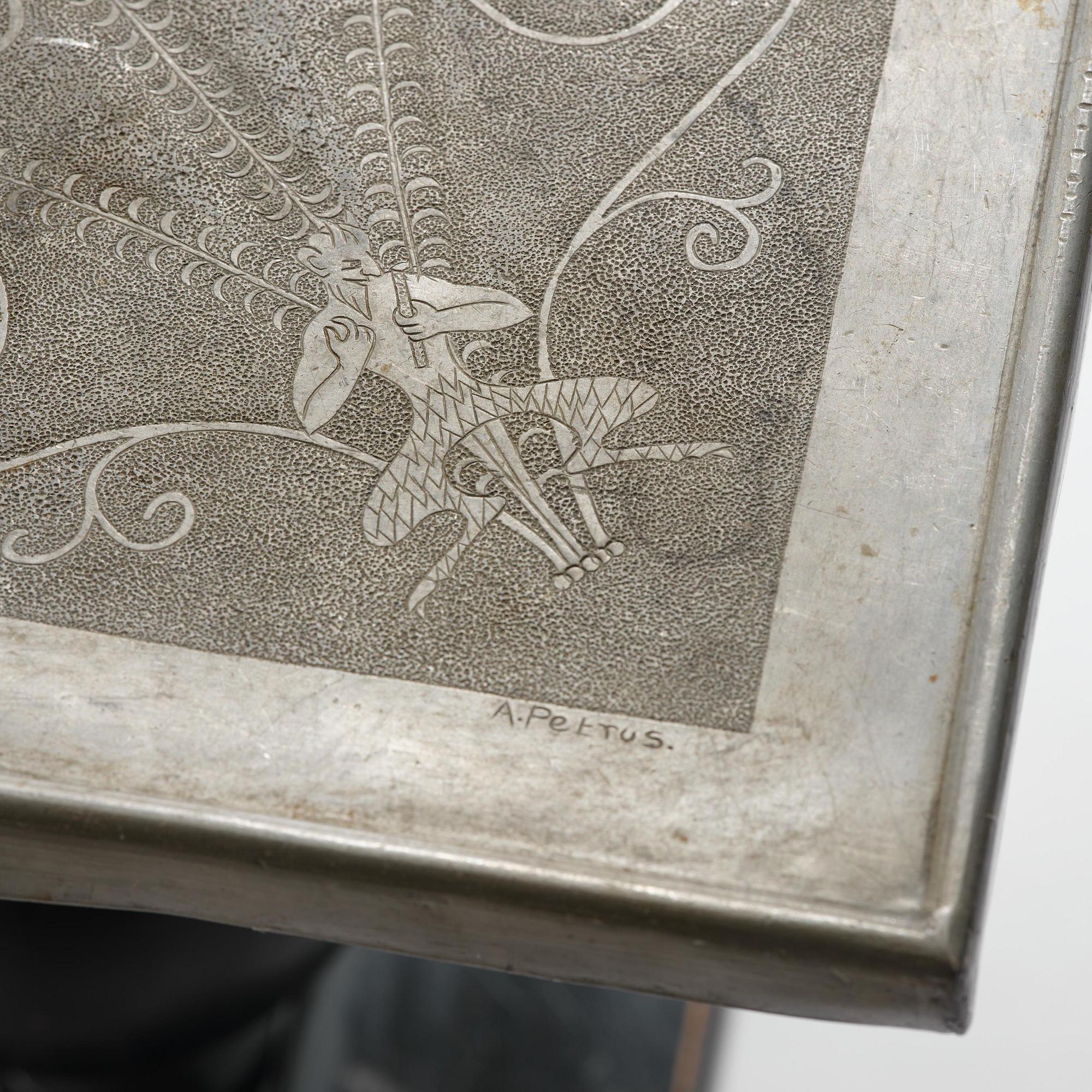 Anna Petrus, a pewter top tray table on a base by Uno Åhrén, executed in her studio, Stockholm, ca 1922-25.