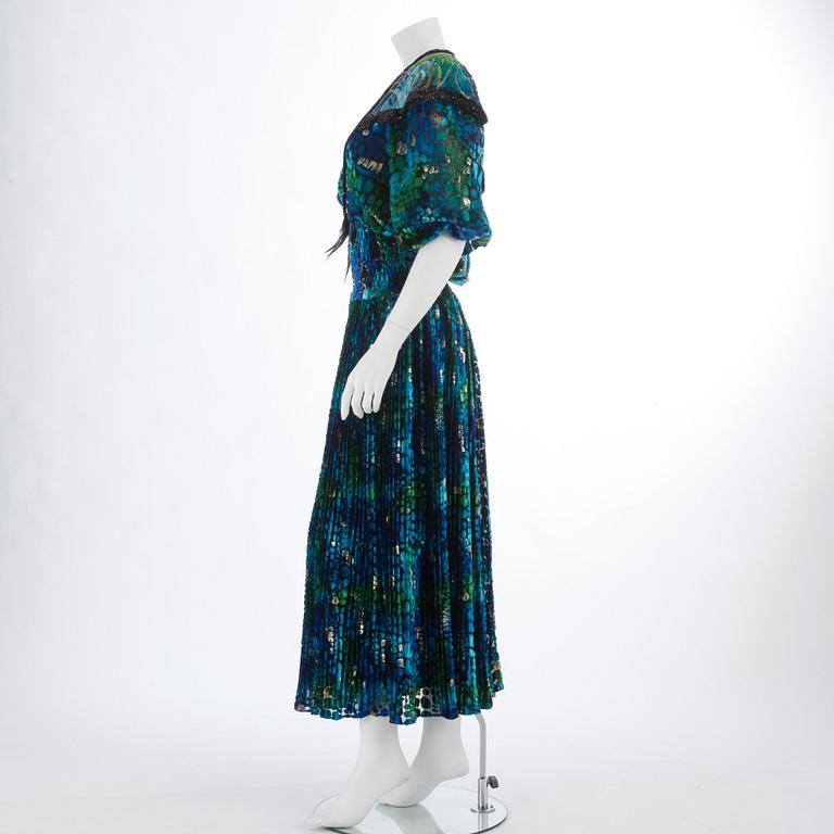 YVES SAINT LAURENT, a blue and green velvet dress.