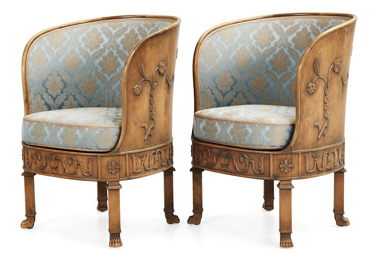 A pair of Axel Einar Hjorth stained birch armchairs 'Caesar' by NK 1928.