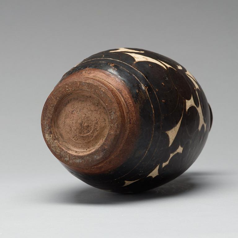 A black-glazed sgraffito vase, presumably Yuan Dynasty.