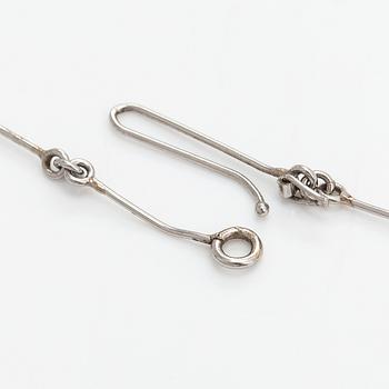 Björn Weckström, A platinum necklace "Nessos" with a ca. 0.10 ct diamond. Lapponia 1981.