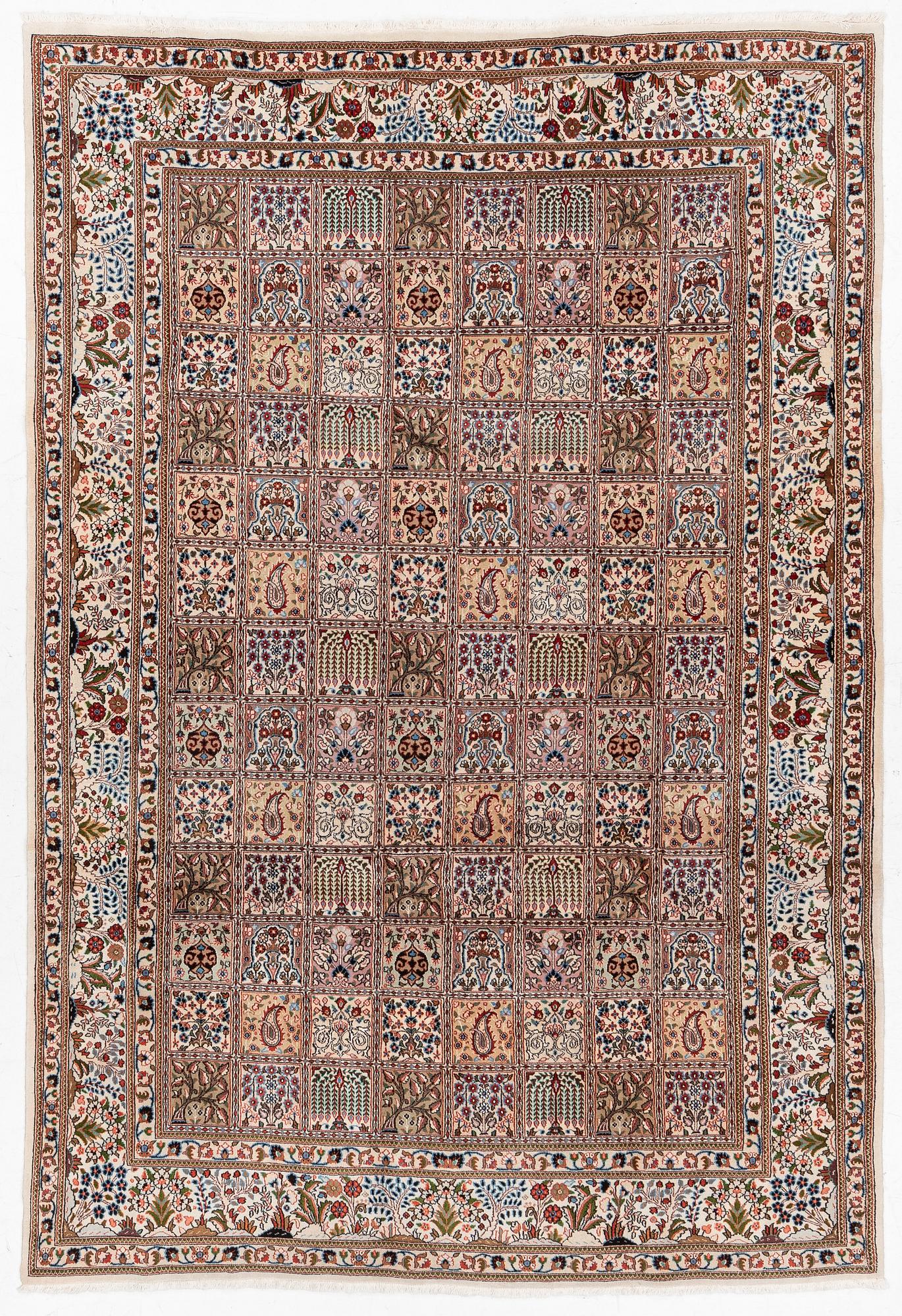 A Moud carpet, part silk, approx. 285 x 195 cm.