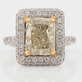 A 3.02 ct radiant-cut Fancy Yellow/VVS2 ring. Certificate from HRD.