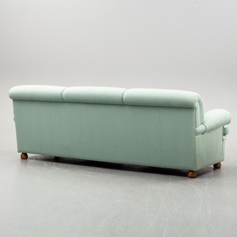 A model 703 sofa by Josef Frank for Firma Svenskt Tenn.