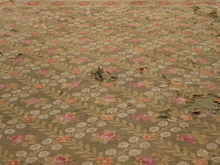 A CARPET, tapestry weave, ca 561-564,5 x 354-360 cm, Aubusson, France the middle to the end of the 19th century.