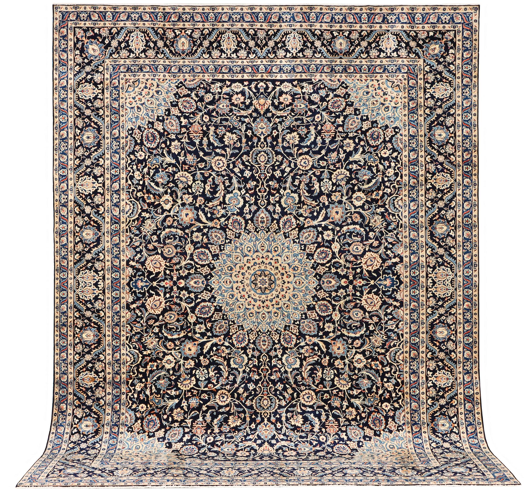 A Keshan carpet, c. 392 x 290 cm.