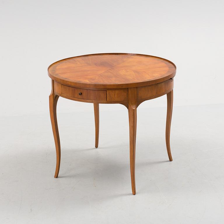 An early 20th century, 'Empire' style drawing room table.