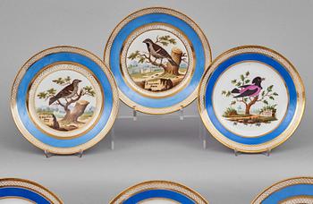 A set of 10 French ornitological dessert plates, signed Schoelber, 19th Century. (8+2).