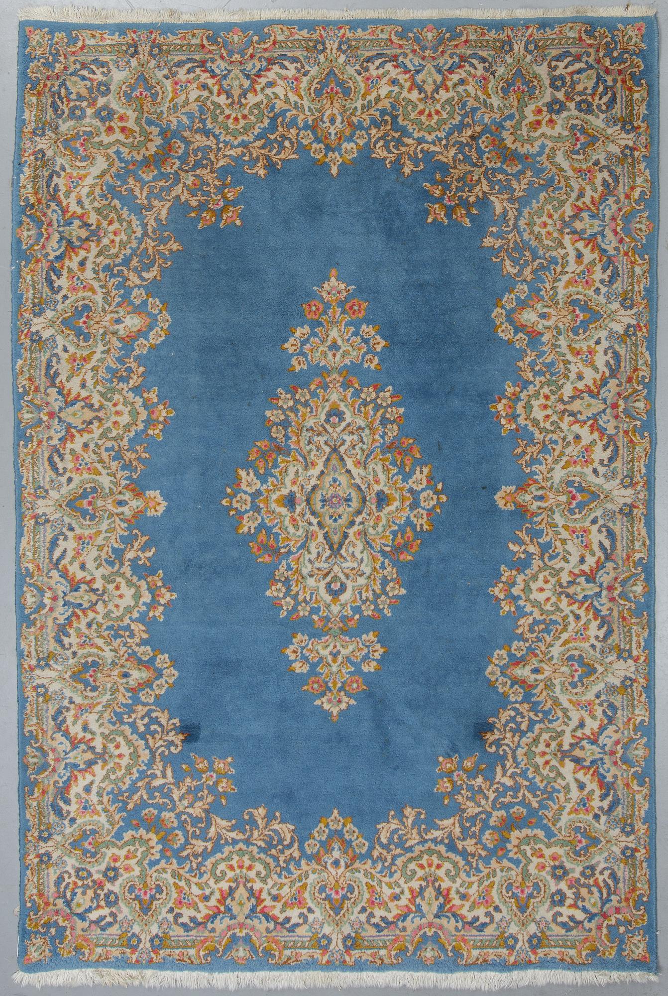 Matto, a semi-antique/an old Kerman, ca 270,5-272,5 x 182-183 cm.