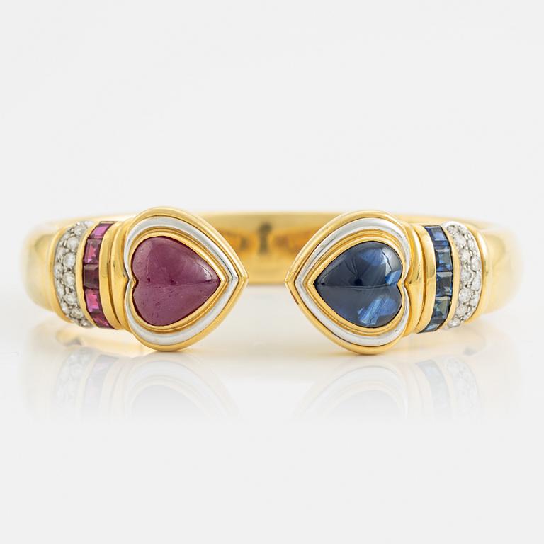 Heart shaped ruby and sapphire and brilliant cut diamond bangle.