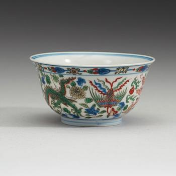 A dragon and phoenix bowl, Qing dynasty with Kangxi's six-character mark (1644-1912).