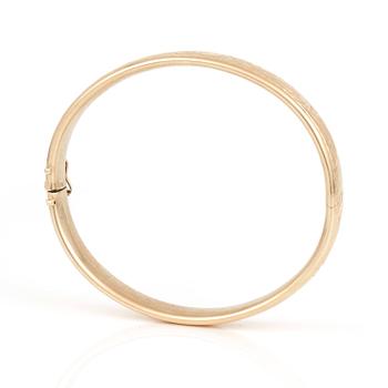 ARMRING med graverad dekor.