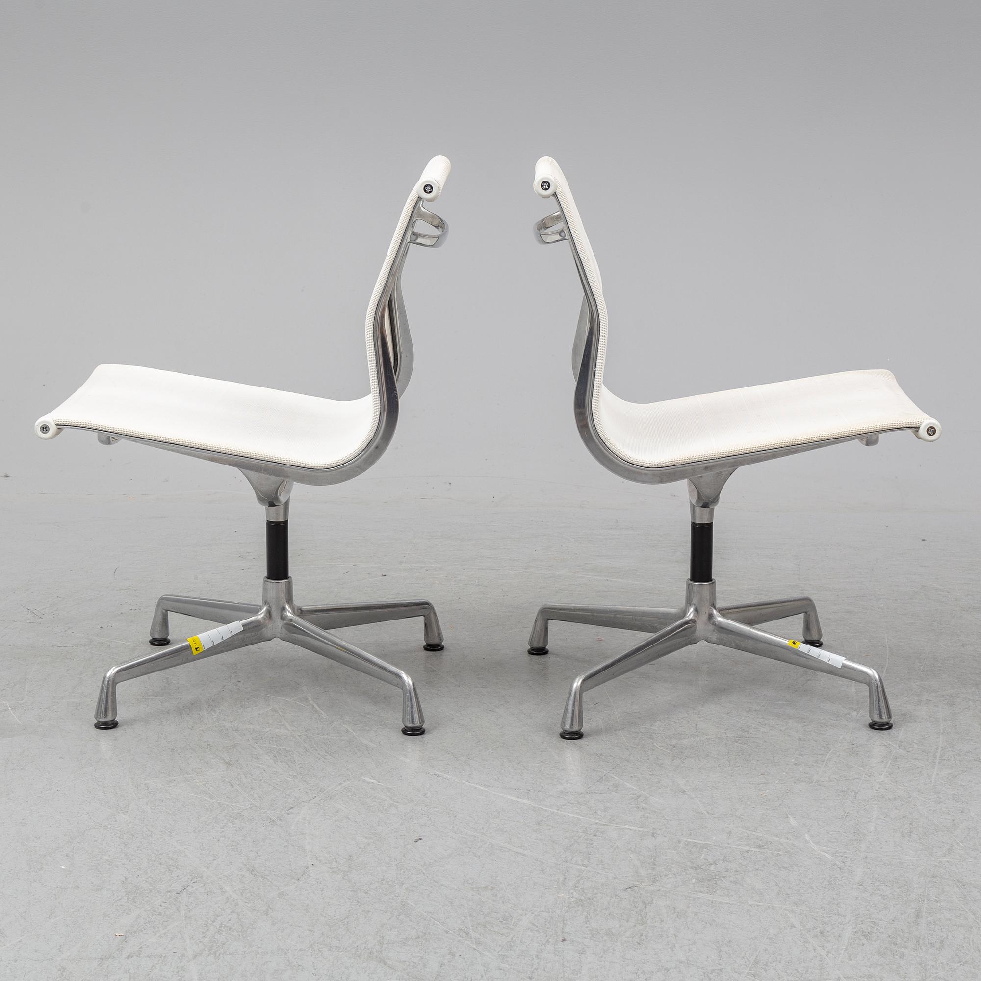CHARLES & RAY EAMES, a pair of 'EA 101' chairs, Vitra.